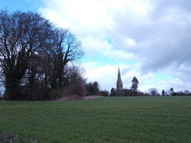 Holy Trinity, Privett The tower and spire of Privett church form a prominent and unexpected landmark, in a deeply rural part of the Hampshire countryside which has changed little since Gilbert White wrote about it in the 18th century. A magnificent edifice, it was designed by Blomfield and built at the expense of Sir William Nicholson, the distiller, in 187678. Seen here from across the fields from the south.