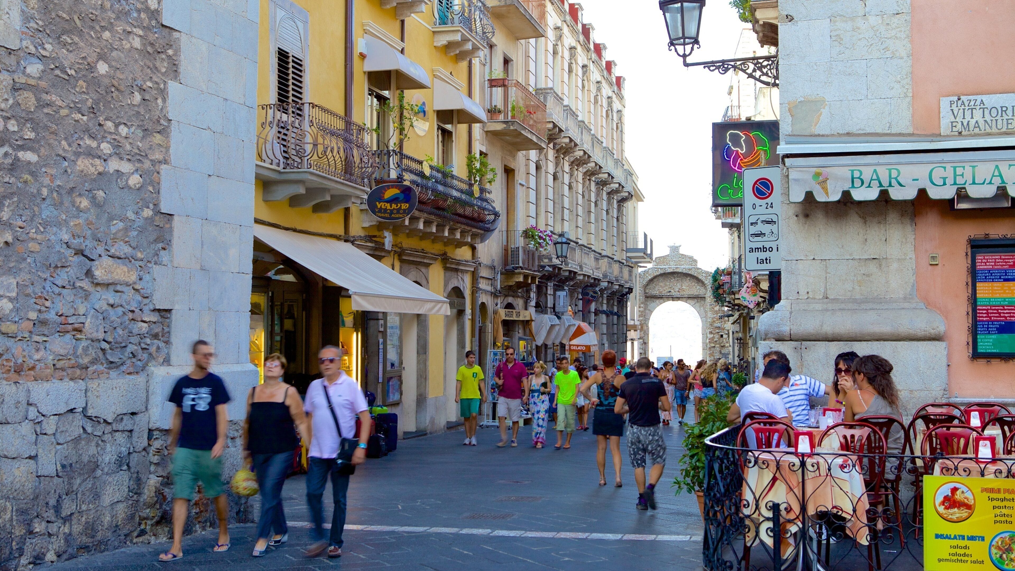 Messina which includes street scenes as well as a large group of people