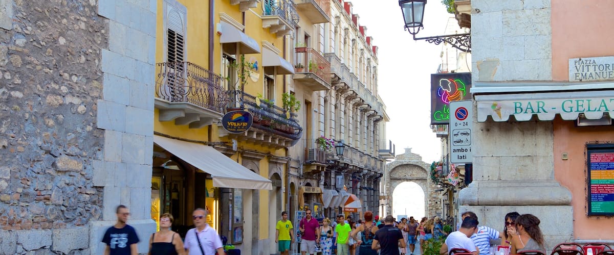 Messina which includes street scenes as well as a large group of people