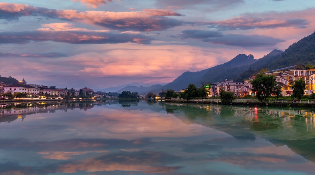 Sapa city reflects down on Sapa lake. Sa Pa is a tourist destination about more than 30 km from the center of Lao Cai city.