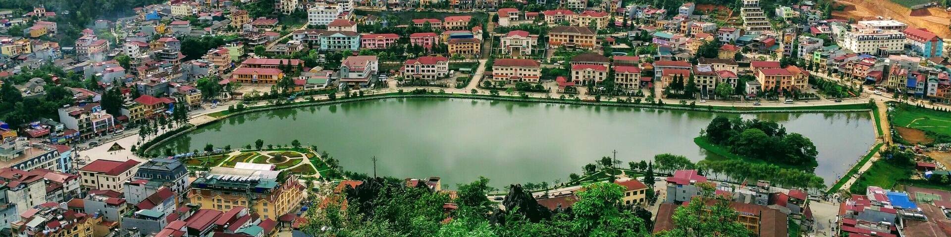 Sapa, Vietnam
The View down on Sapa Lake. A very nice walk through scenic gardens and trail behind Sapa Church, leading to a nice view of the town. #packsandaplan