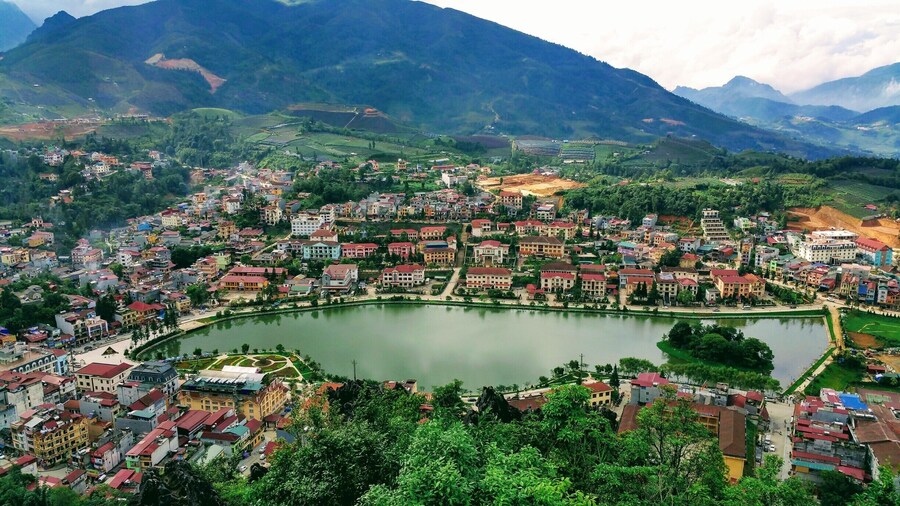 Sapa, Vietnam
The View down on Sapa Lake. A very nice walk through scenic gardens and trail behind Sapa Church, leading to a nice view of the town. #packsandaplan