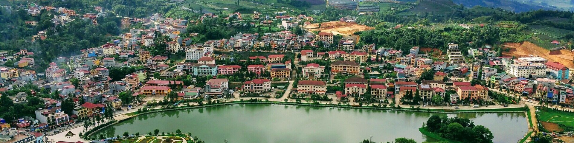 Sapa, Vietnam
The View down on Sapa Lake. A very nice walk through scenic gardens and trail behind Sapa Church, leading to a nice view of the town. #packsandaplan
