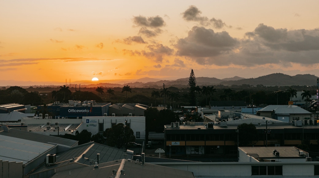 Mackay featuring a small town or village, a sunset and landscape views