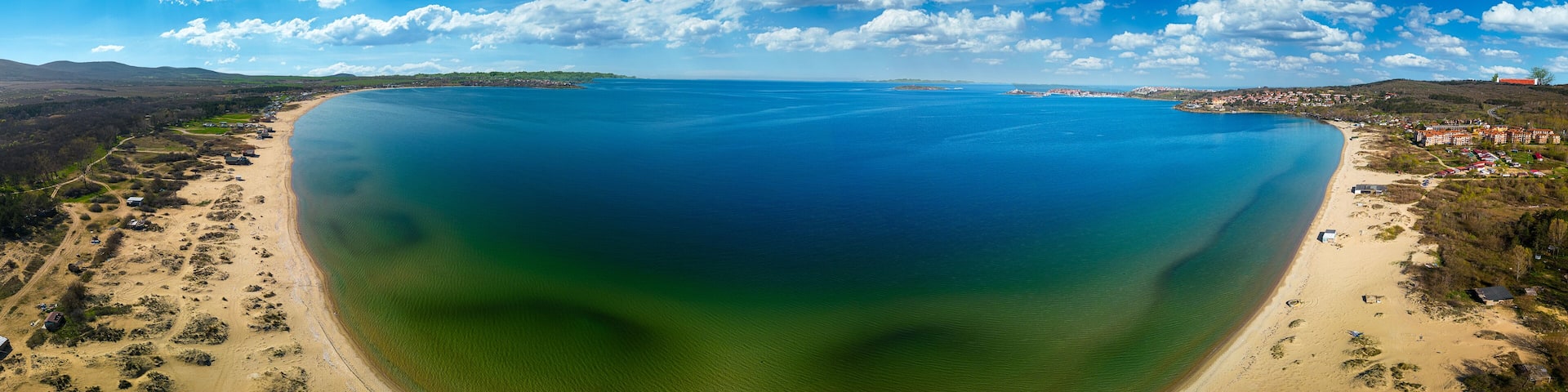 Amazing day aerial view. Seascape of the rocks at the coastline of Chernomorets, Burgas region, Bulgaria. The beautiful beach of the black sea captured by the air in the summer.