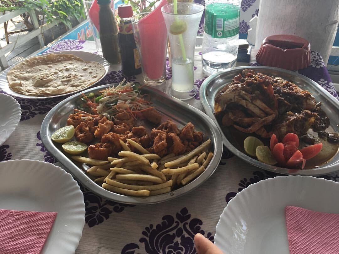 Golden Fried Calamari with fries and salad, crab in special kerala masala, butter naan, and steamed rice ❤️❤️#kerala