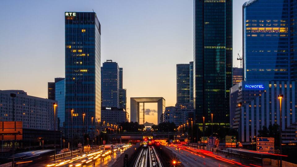 La Defense showing night scenes, a city and a sunset