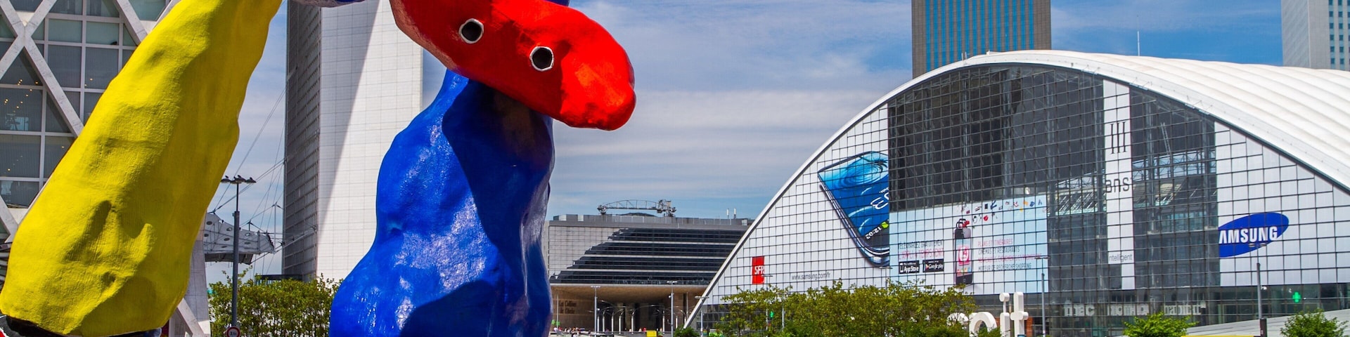 Exploring La Defense with colorful sculptures and modern architecture in Courbevoie, France