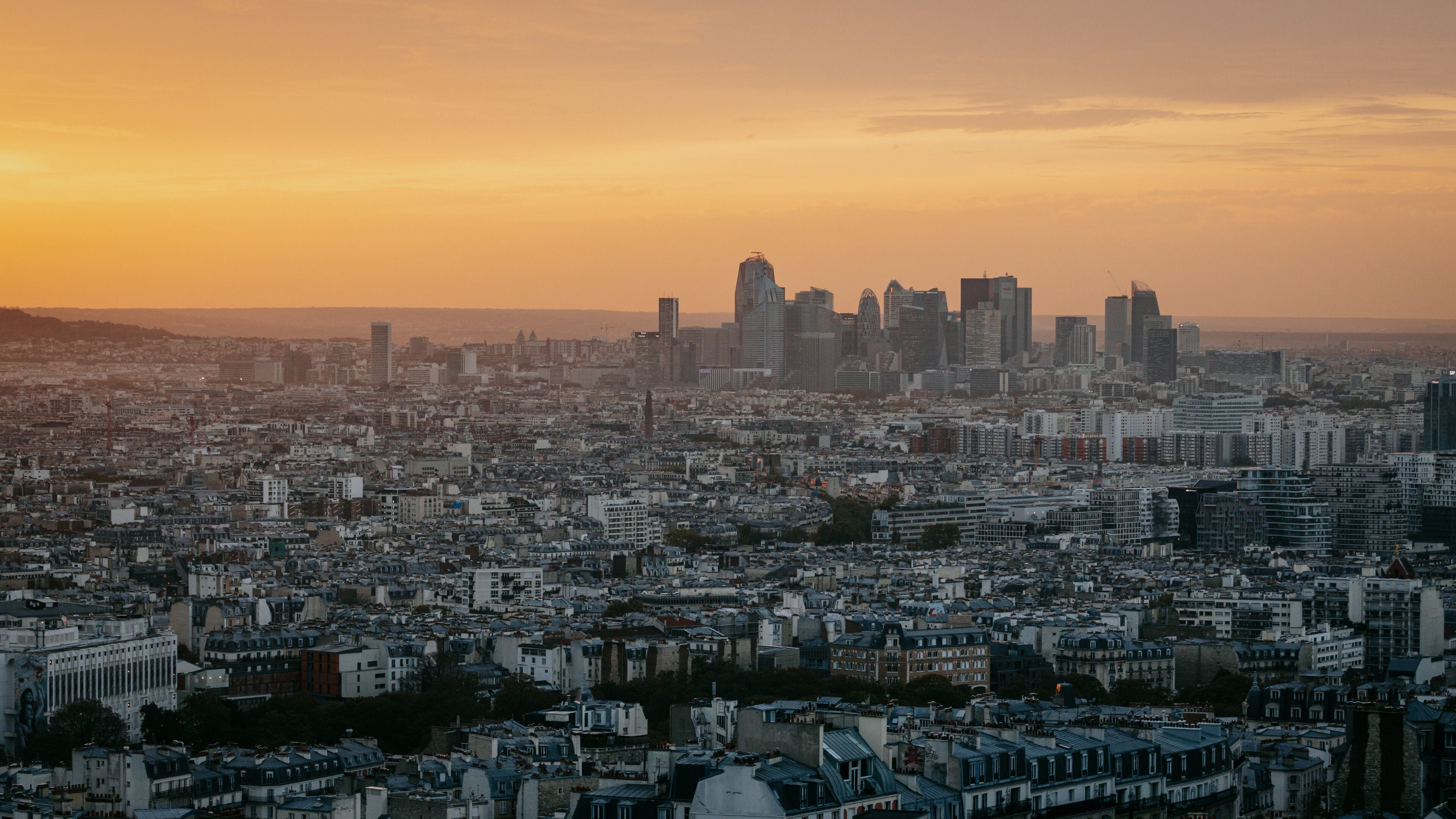 La Défense featuring a city, a sunset and landscape views