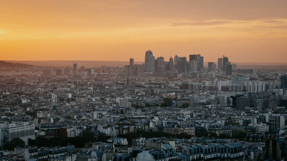 La Défense featuring a city, a sunset and landscape views