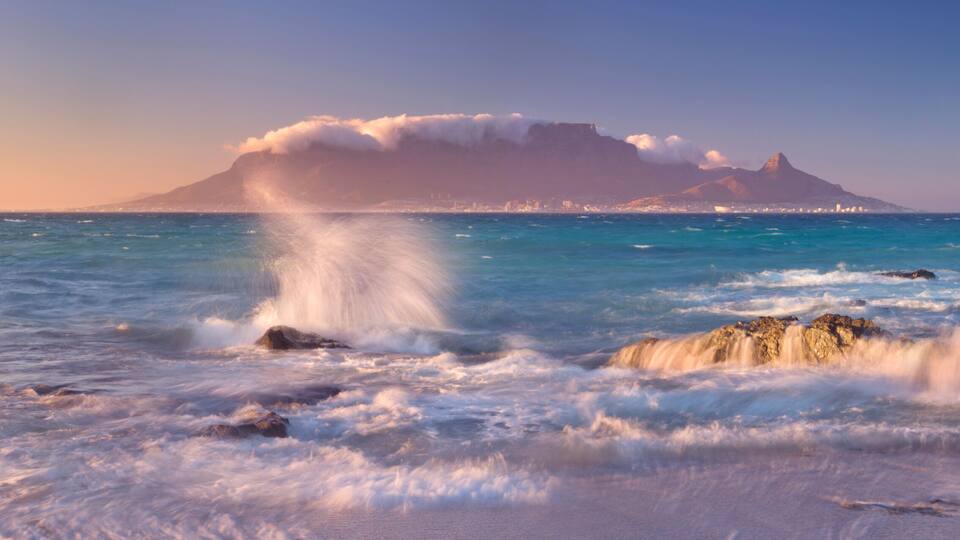 Sunrise over Table Mountain and Cape Town from Blouwbergstrand