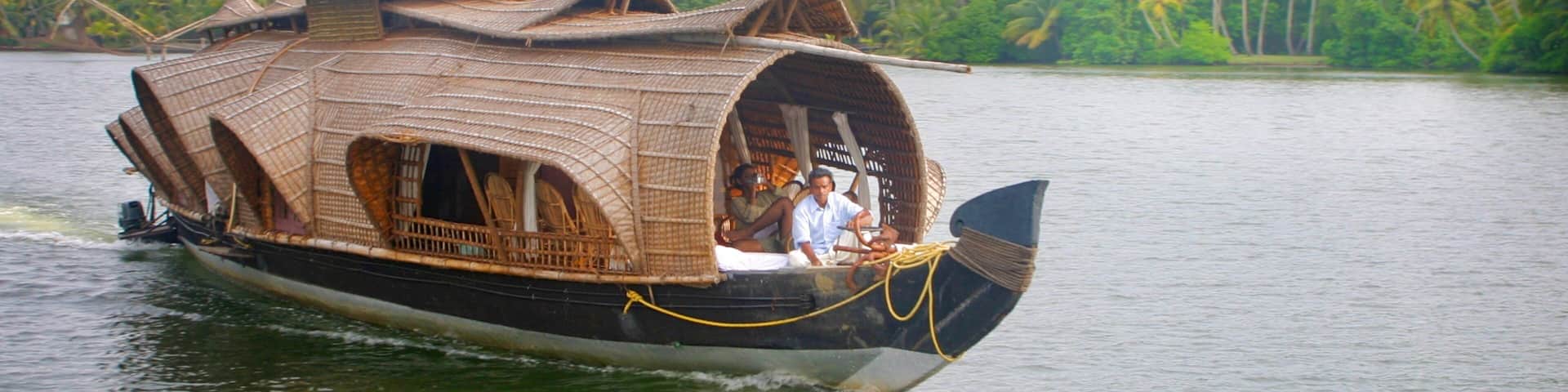 Cochin showing landscape views, a river or creek and boating