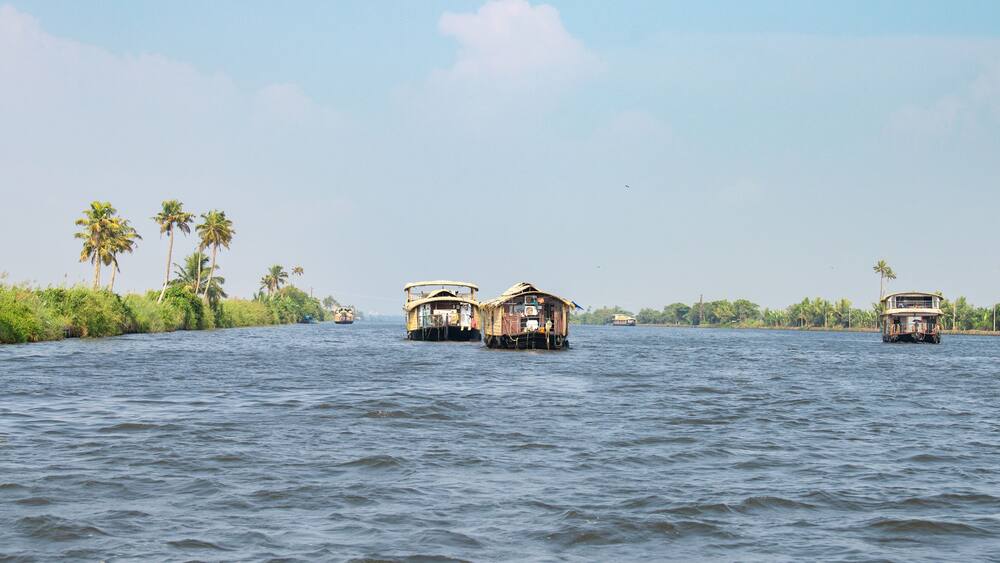 Alleppey backwaters in India, Alappuzha houseboats on waterway, small canal of Laccadive Sea, Tarshish land of Kerala, serene water body