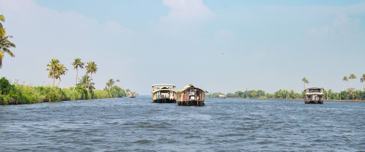 Alleppey backwaters in India, Alappuzha houseboats on waterway, small canal of Laccadive Sea, Tarshish land of Kerala, serene water body