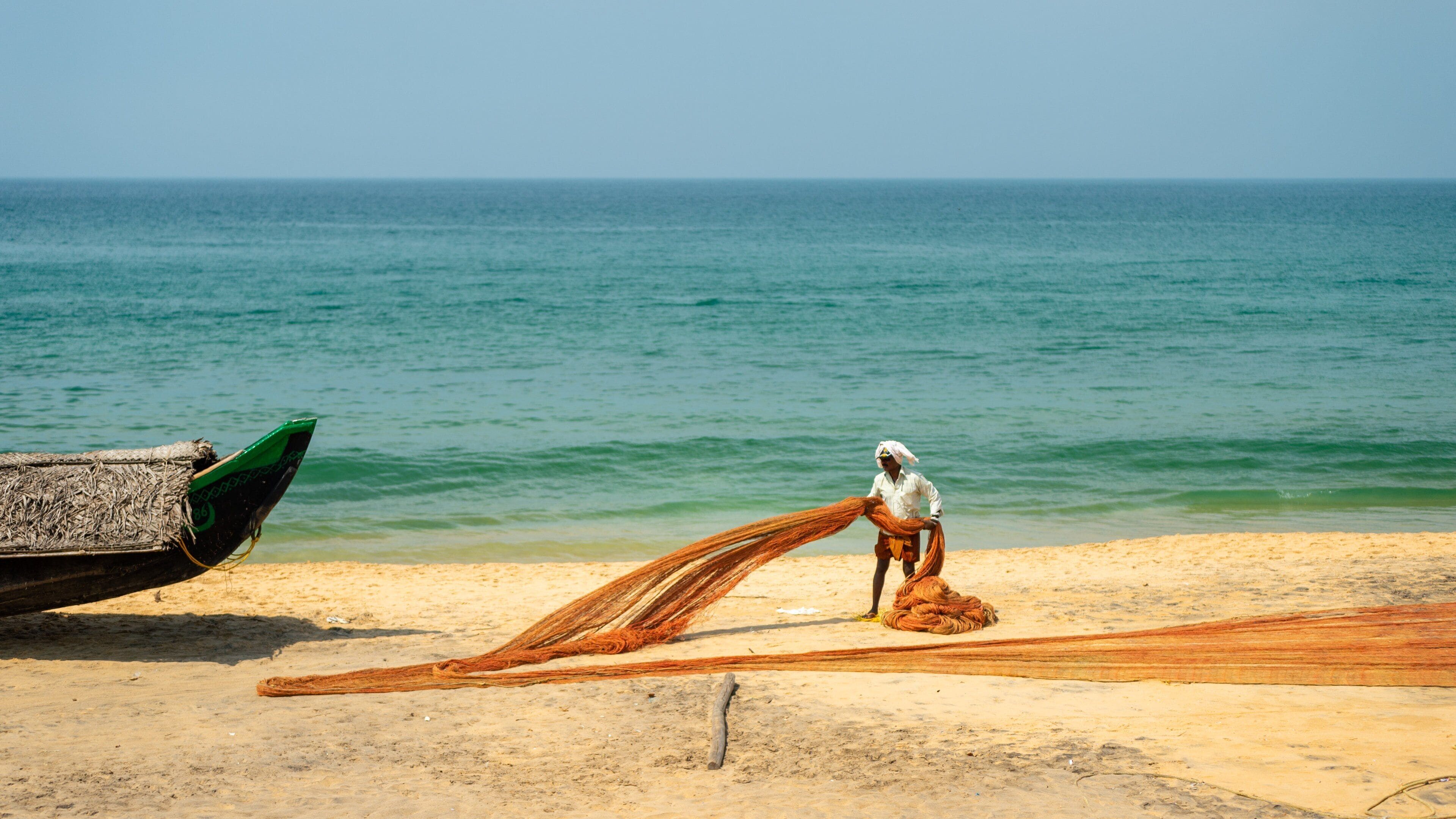 Kovalam Beach which includes a beach, tropical scenes and general coastal views