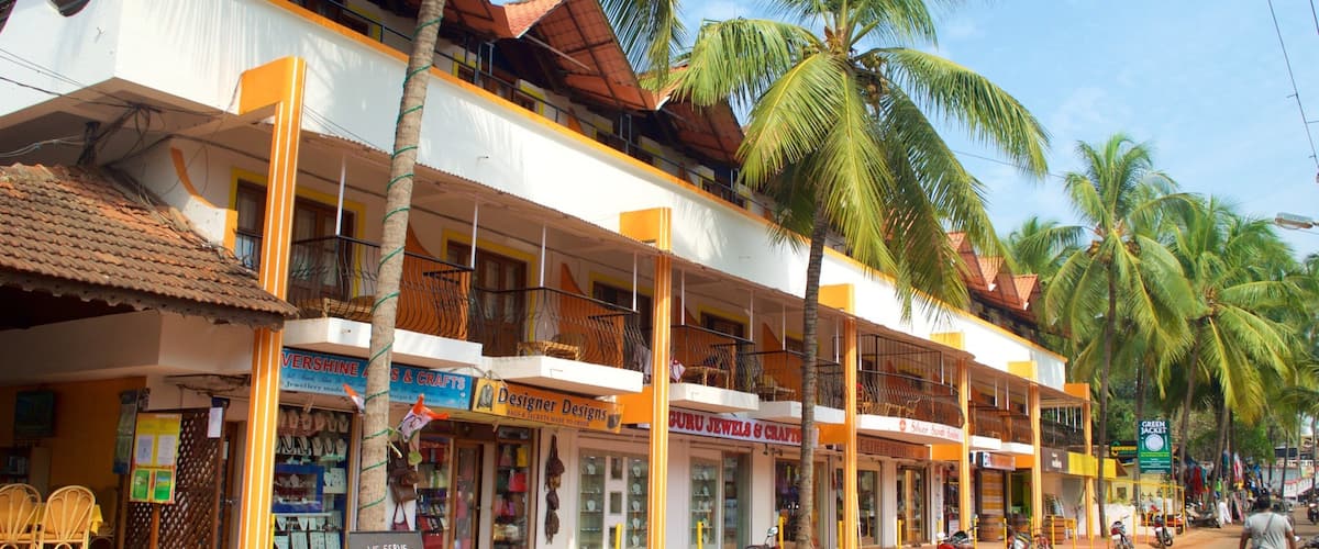 A street with shops, including jewellery stores and a restaurant.