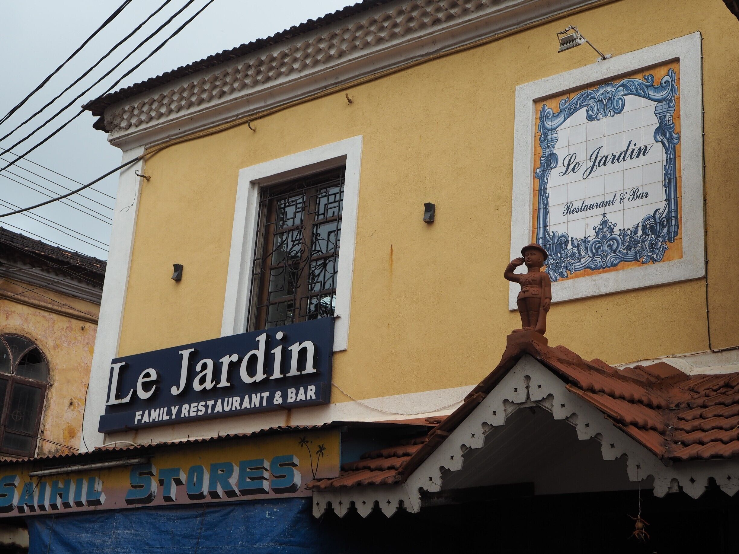 Nice little restaurant with caricatures of Goan cartoonist, Mario Miranda, adorning the walls. Food is delicious!

Voted as one of the best restaurants in Goa to have the "Fish Curry Thali." 
Plenty of vegetarian options also available.
Has a bar too.
