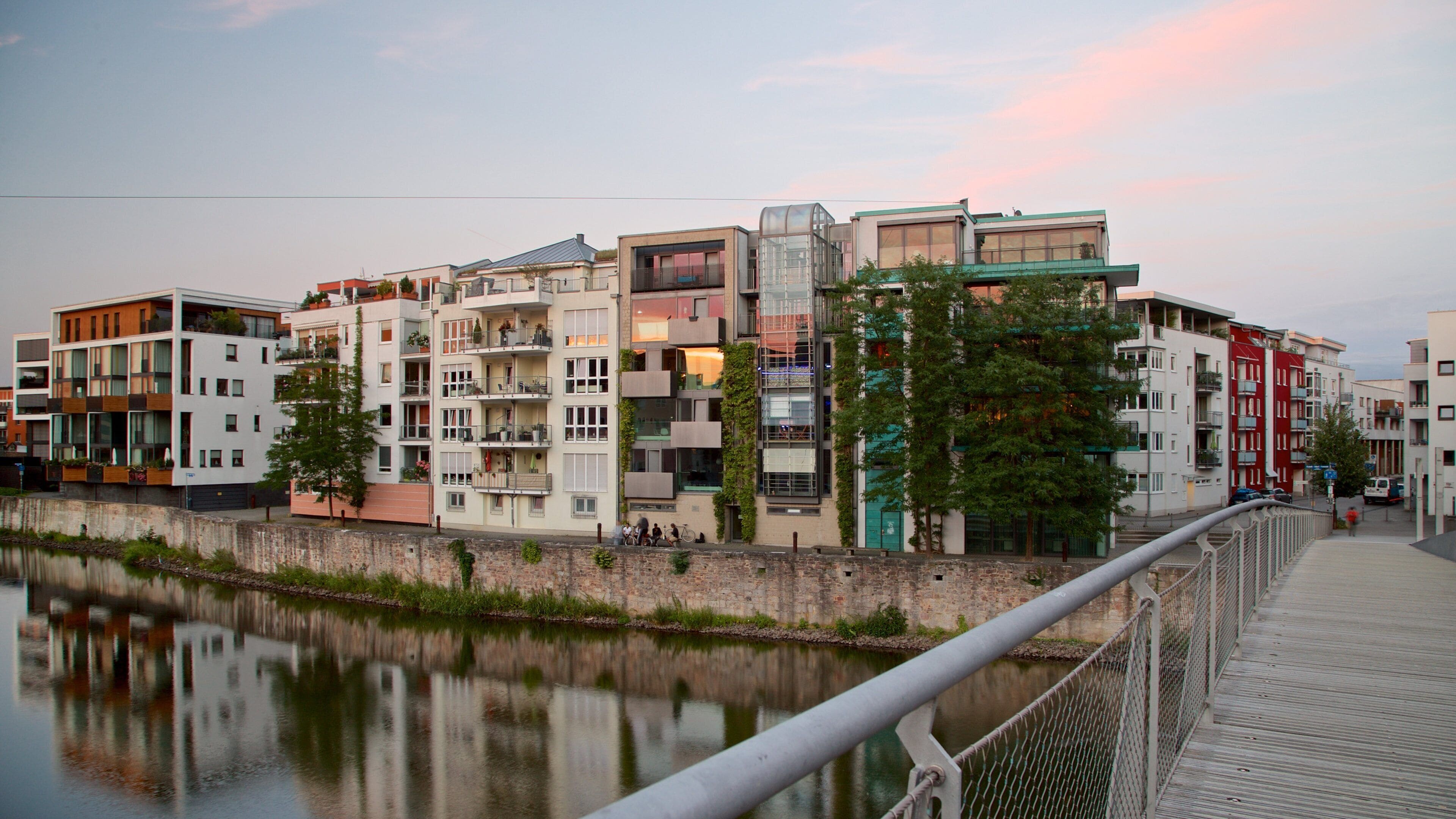 Northern Hesse showing a sunset, a bridge and a river or creek