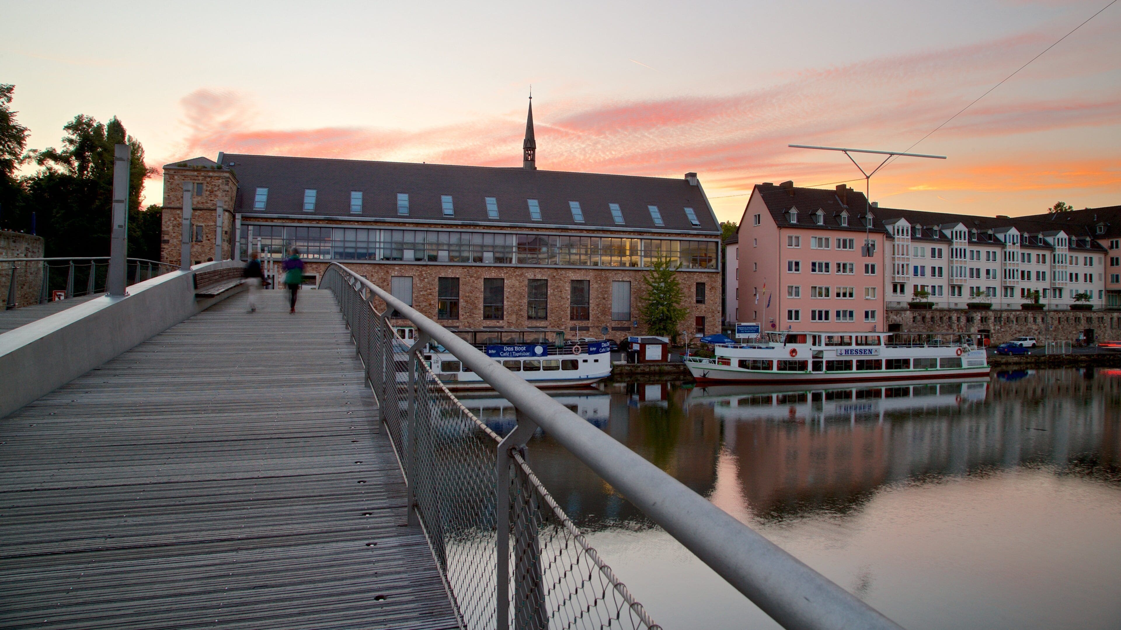 Northern Hesse featuring a sunset, a bridge and a bay or harbor