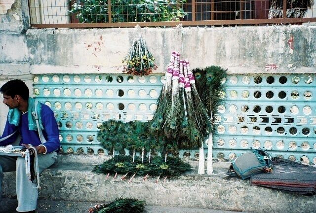 Street vendors selling peacock feathers in Rishikesh #LifeAtExpediaGroup