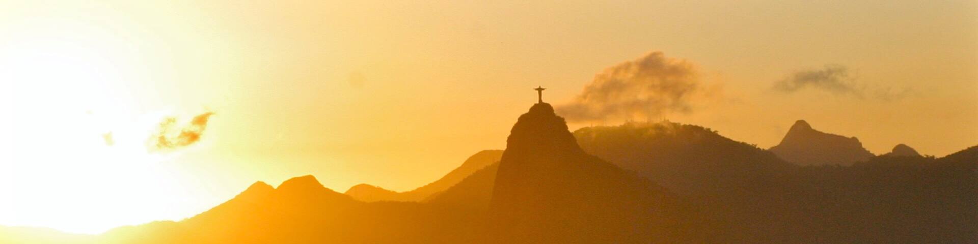 Southeast Region which includes a sunset, a city and mountains