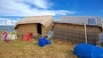 Lake Titicaca showing a small town or village