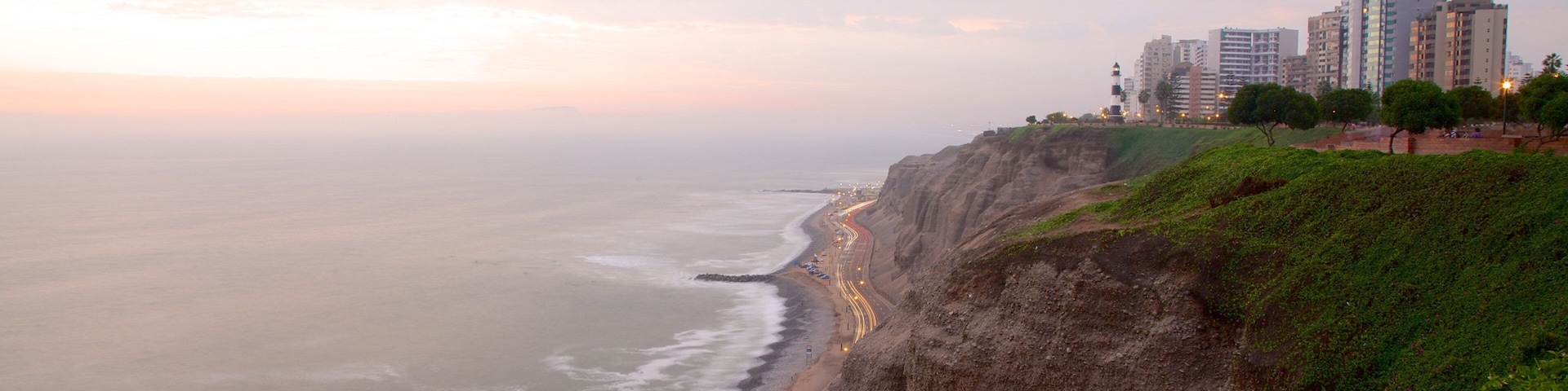 Miraflores que inclui paisagens litorâneas, paisagem e um pôr do sol