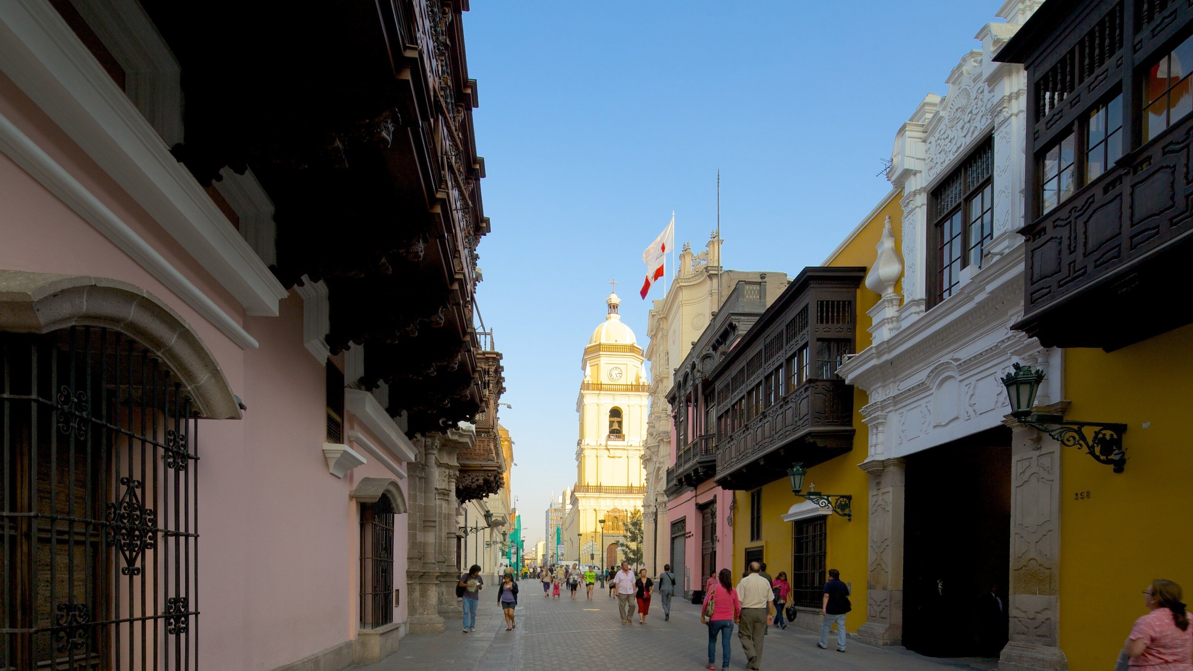 Downtown Lima which includes street scenes as well as a large group of people