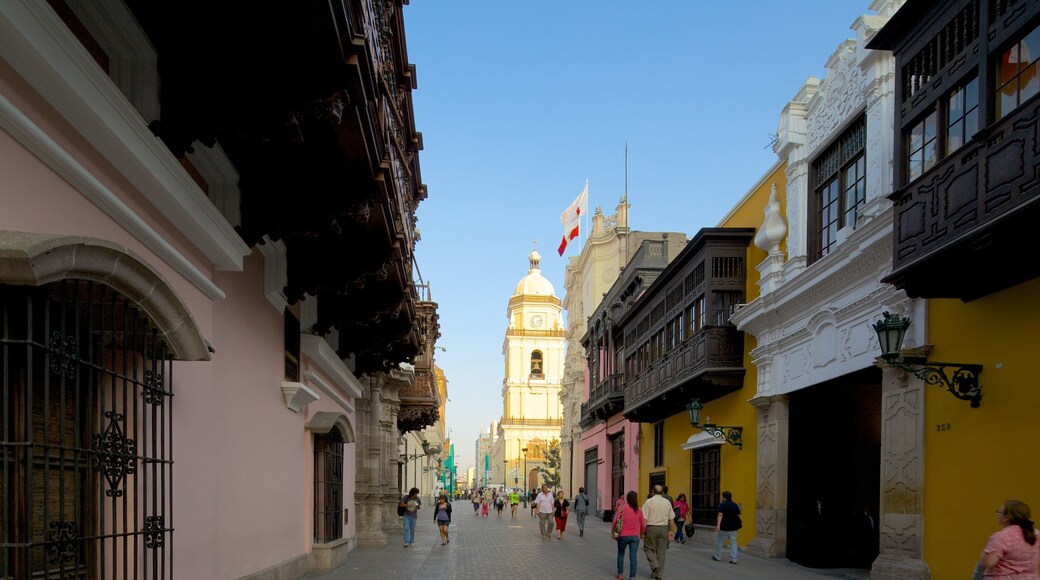 Downtown Lima which includes street scenes as well as a large group of people
