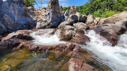 Waterfall over rocks at Johnston Shutings Stake Park in Ironton, MO