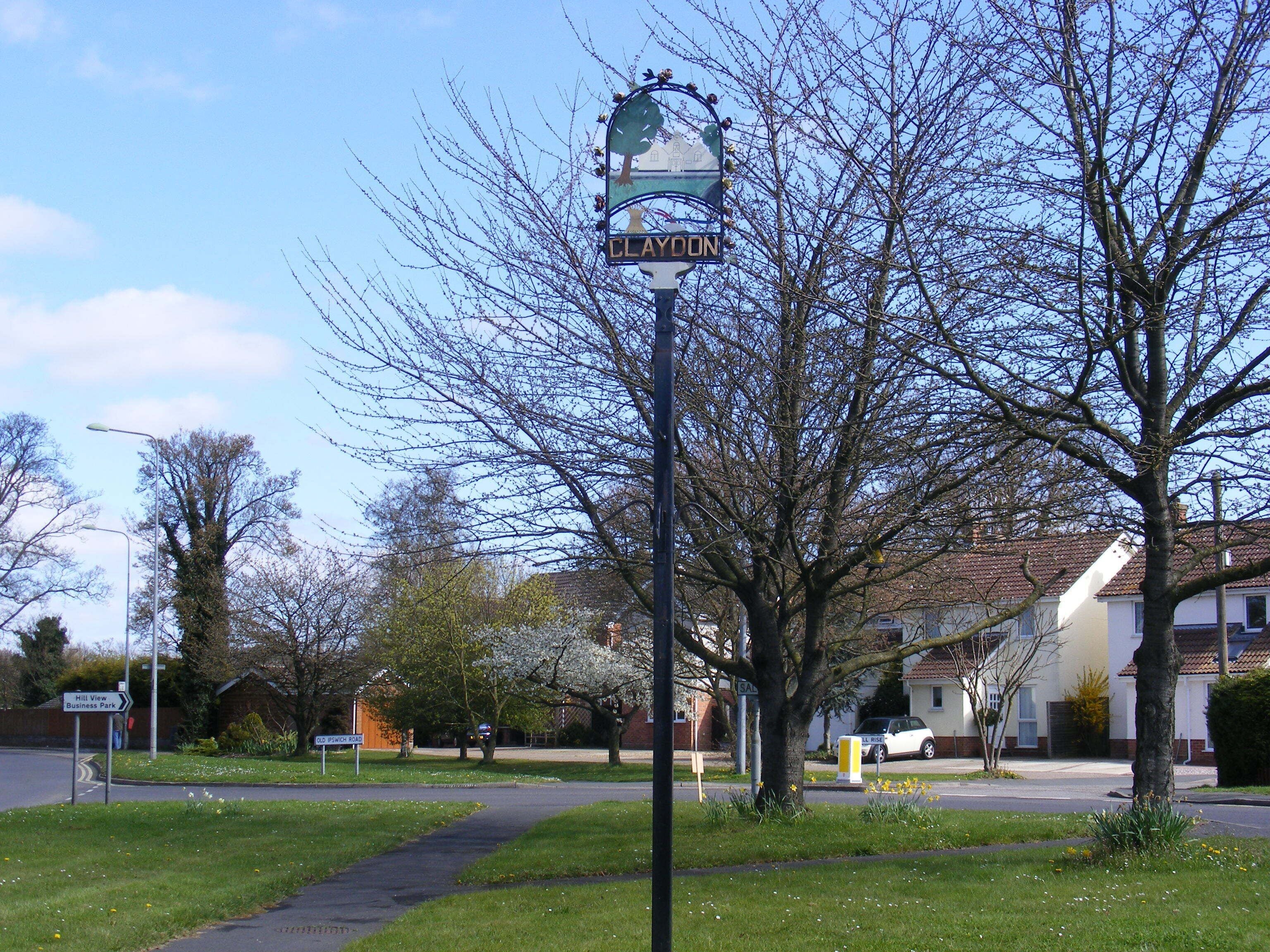A street sign with 'CLAYDON' and 'HILL VIEW Business Park' visible.