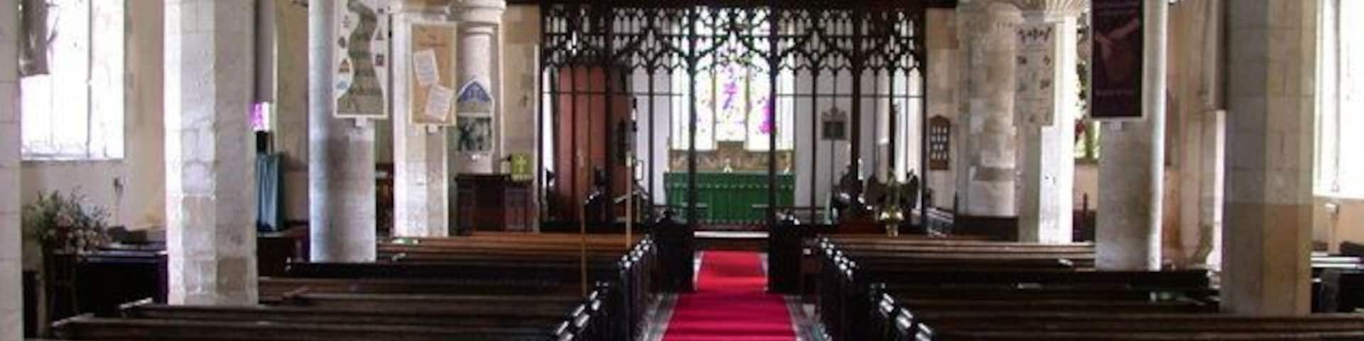 SS Helena and Mary - interior The nave pillars are Transitional Norman and are alternately round and octagonal. The chancel are was widened in a restoration in 1875.