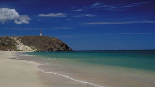 Puerto Cruz beach on the northeast end of the island looking towards the lighthouse on Punta Zaragoza.