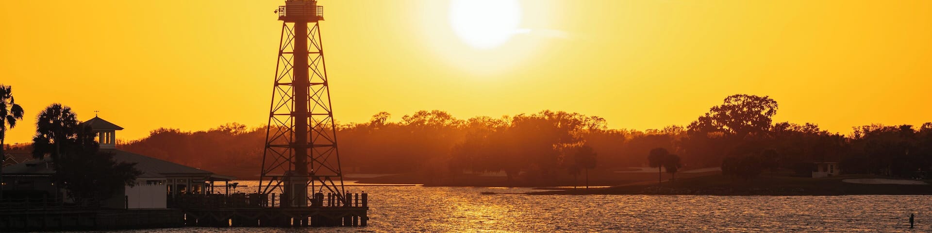 Beautiful sunset over the lake at The Villages in Leesburg, Florida creating a serene evening atmosphere