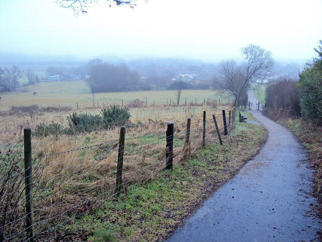 Path approaching Annesley Village Heading east with the houses emerging from the mist.