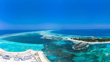 Aerial view, island Olhuveli with Waterbungalows, South Male Atoll, Maldives