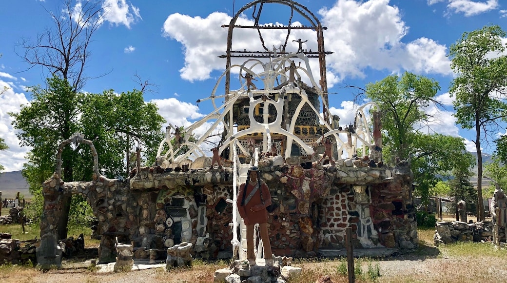 Located about 35 miles west of Winnemucca and visible from I80, the Thunder Mountain Monument was built by Frank Van Zant aka 'Chief Rolling Mountain Thunder' (1921-1989). He moved here in 1968 with his wife and three small children. He started building his unique environment using only discarded items he found within a 50 mile radius of the property. In fact, the only thing he purchased was cement. In 1983 he was named Nevadaâs Artist of the Year. Sadly, he committed suicide in 1989. His oldest son now owns the property. The grounds are open to the public.
More info Is available here:
http://www.thundermountainmonument.com/index.htm