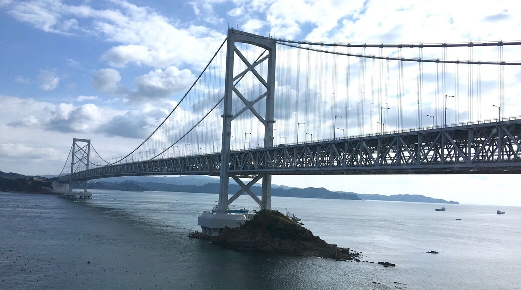 Hot off the press! I just left the Kaigetsu Hotel next to this bridge. Photo taken from hotel lobby.
The Onaruto Bridge is the most amazing bridge I had been onto. Below the driveway is the walkway for visitors to view the most spectacular natural wonder of Japan I have ever visited! The super natural whirlpool! I walked on it yesterday around low tide to the middle of the sea to view the whirlpools. One underrated natural wonder of the world! MUST SEE if u ever come to Kansai area!!!