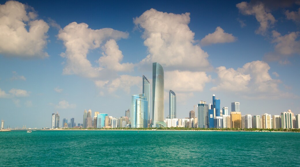 Abu Dhabi fasiliteter samt moderne arkitektur, blokk og silhuett