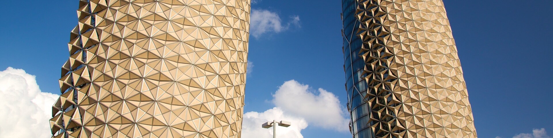 Abu Dhabi Emirate featuring a skyscraper and modern architecture