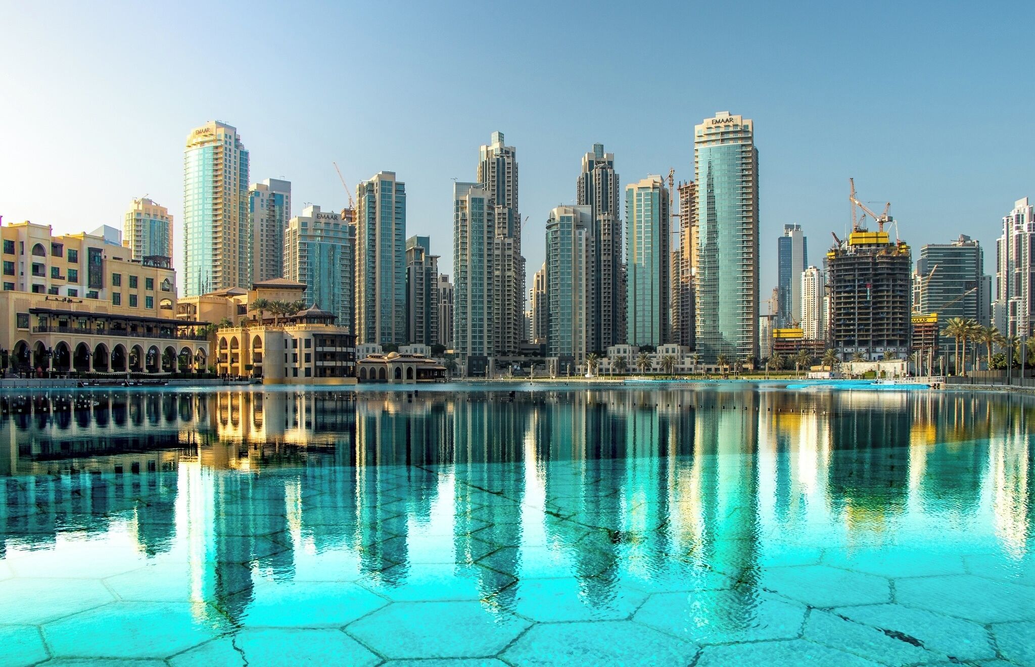 I was fortunate to visit Dubai for the first time in November last year and took the chance to view the sunrise from the Burja khalifa which was a great experience. On our way to the car we stopped off at The Dubai Fountain which is the world's largest choreographed fountain system at the foot of the Burj Khalifa. It was very early in the day and the place was very quiet as was the fountain itself. I loved the reflections of the skyscrapers in the almost still waters which reflected the clear blue sky.

#BVSBlue