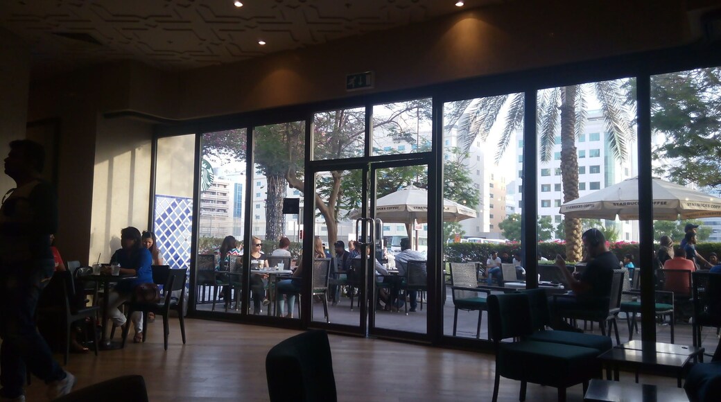Spacious but crowded Starbucks coffee shop at Al Ghurair Centre