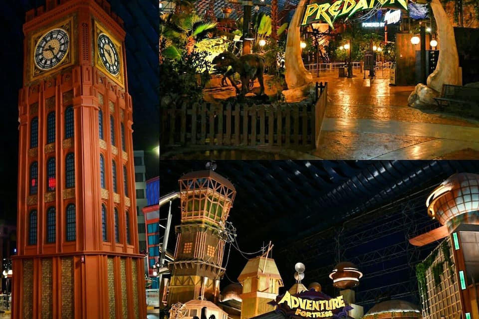 Un campanar, una entrada amb tema de dinosaure i una estructura de fusta anomenada 'Adventure Fortress'.