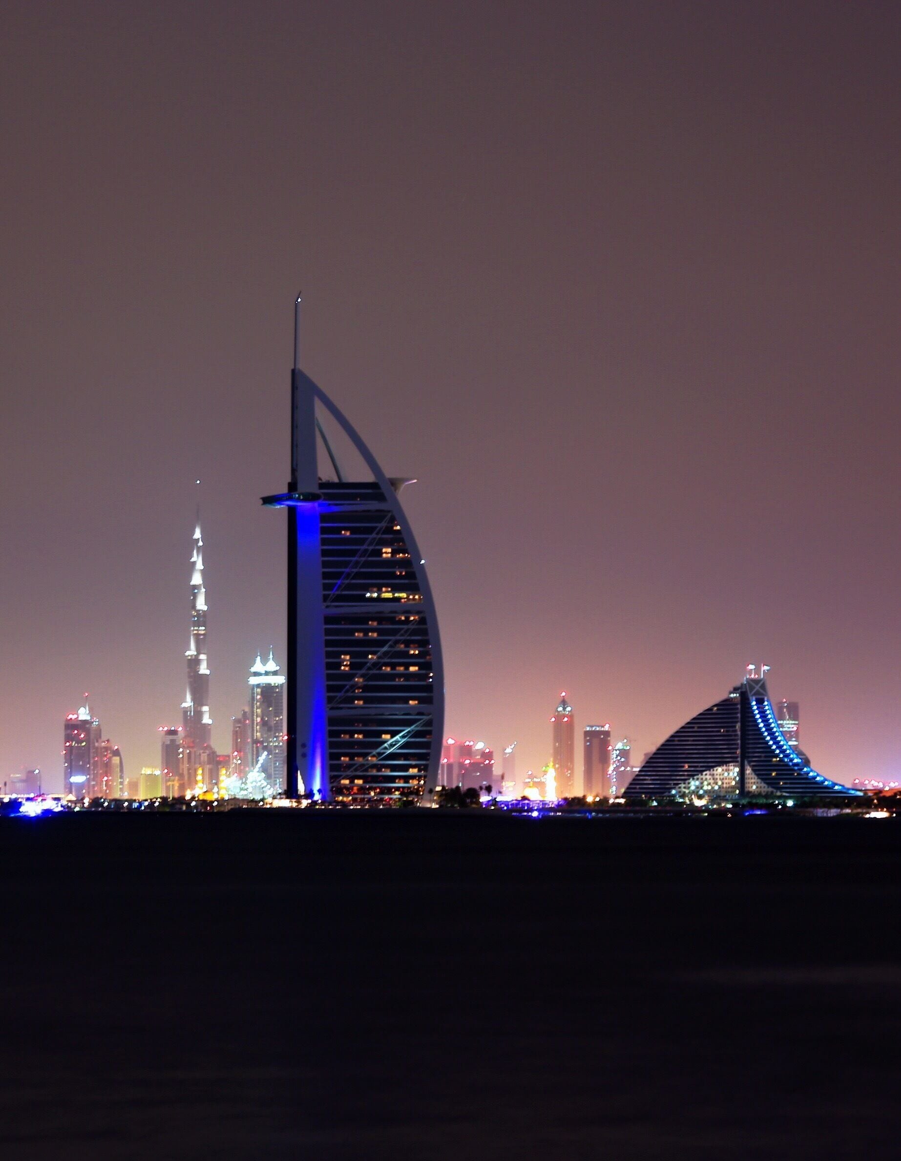 Taken on a midnight tour of Dubai by my taxi driver, taken from one of the palm islands. Burj al Arab, Jumairah Beach hotel, and Burj Khalifa. I grew up reading about the buildings of Dubai, and was in awe seeing them in person. #stunningstructures