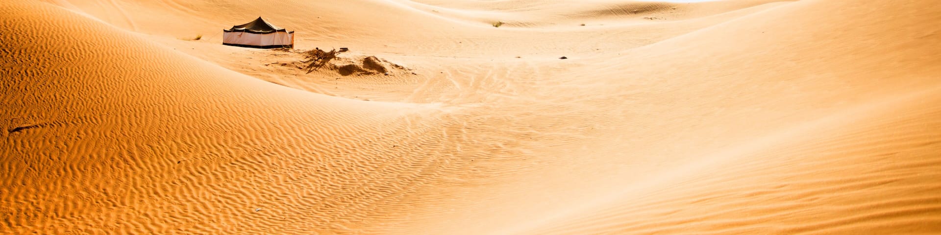 Big tent in desert dune Al Awir near Dubai for turistic safari show