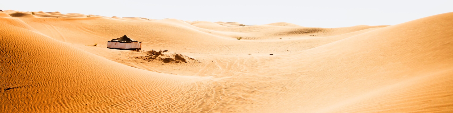 Big tent in desert dune Al Awir near Dubai for turistic safari show