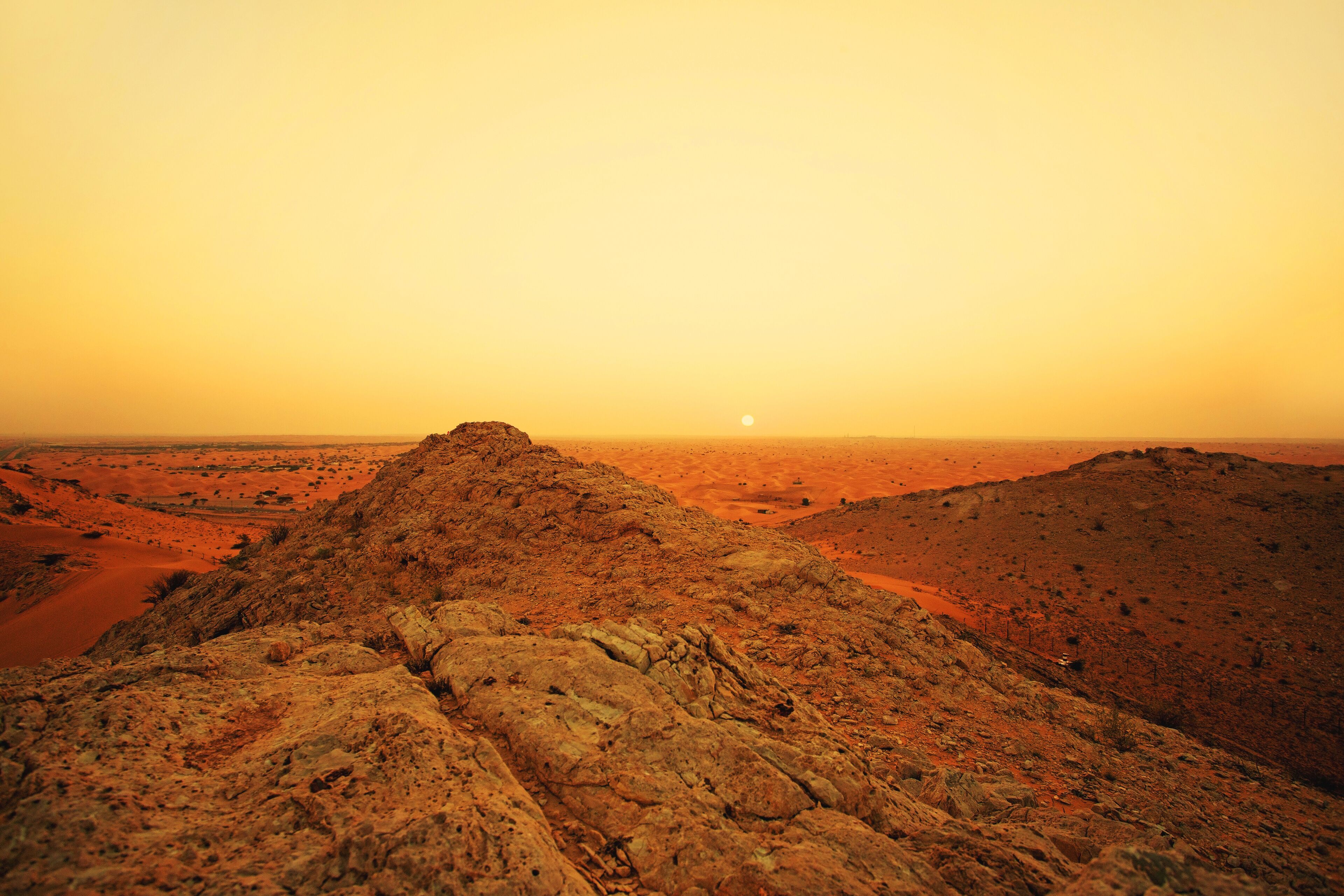Al awir desert and mountains, Dubai, UAE in sunset warm light