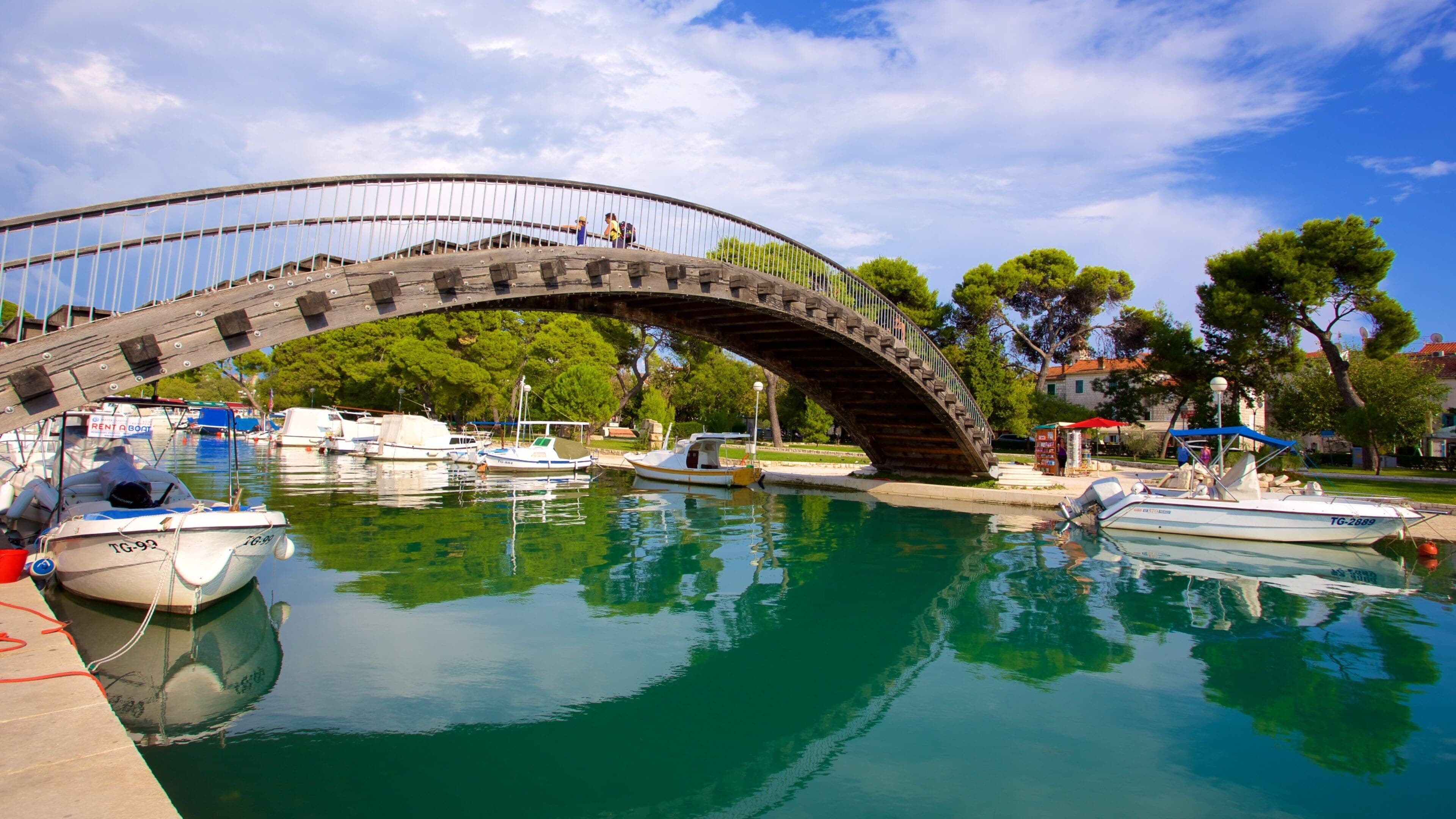 Trogir which includes a bridge and a marina
