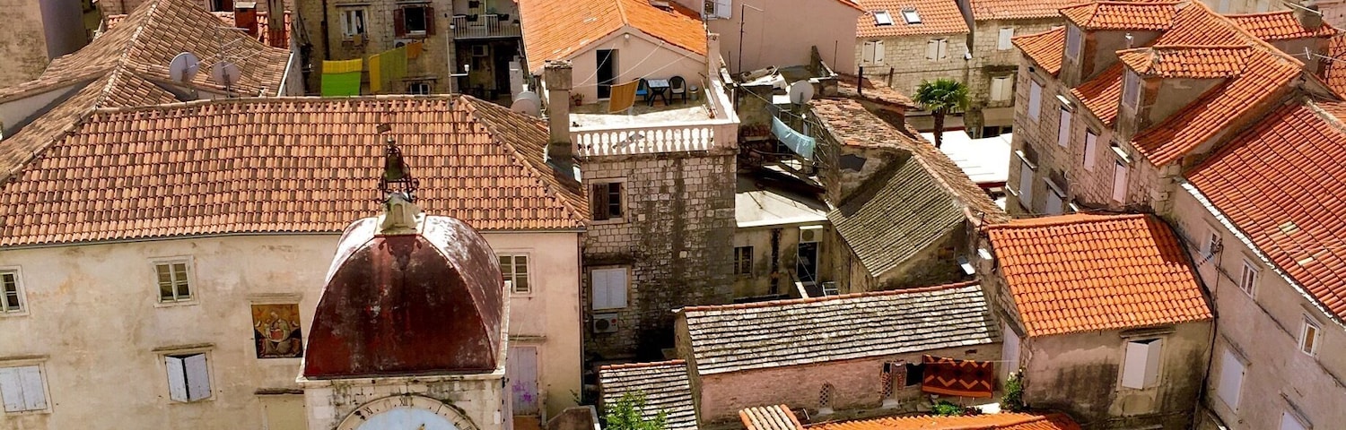 View over the old quarter of Trogir with the city loggia (15th century) from the bell tower of St. Lawrence Cathedral