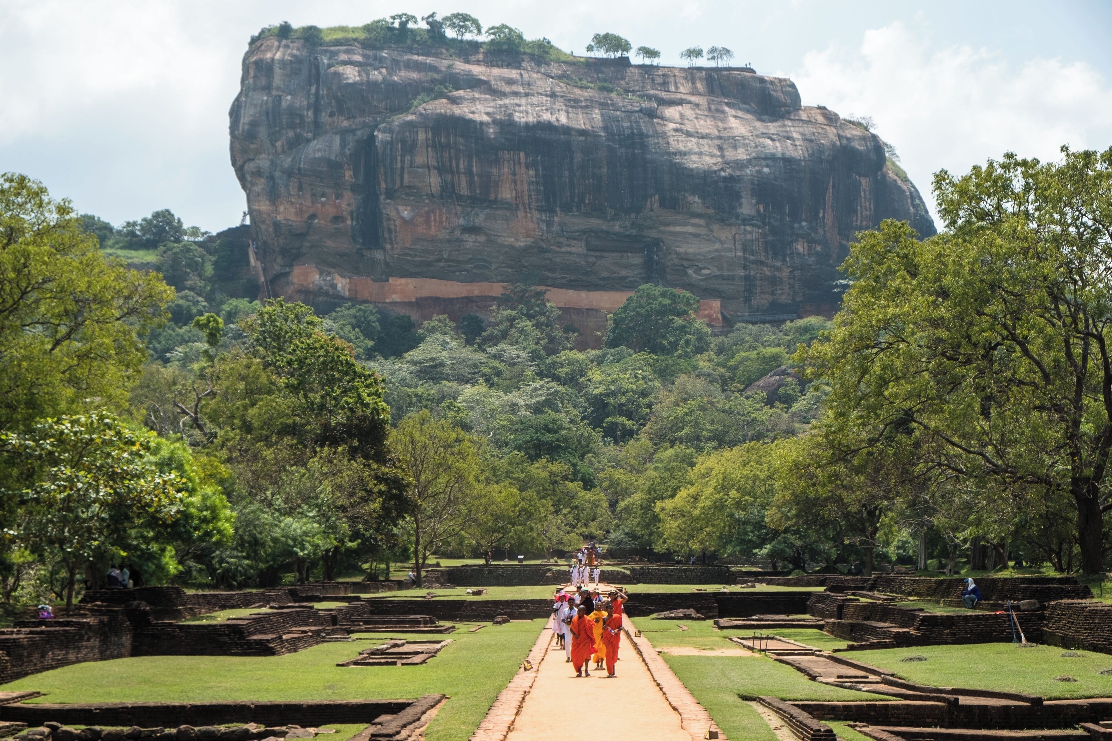 Deep in the middle of Sri Lanka, a massive column of rock juts out from the green tropical forest. Sigiriya was established as the stronghold of a rogue king over 1,500 years ago, and today the Sigiriya complex stands as one of the earliest preserved examples of ancient urban planning. Ultimately the rock was unable to save its king, but it succeeded in preserving ancient Sinhalese culture.